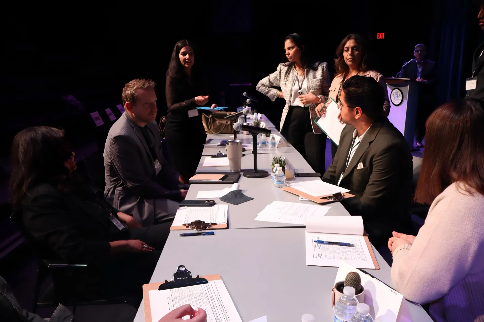 A student team fielding questions from the panel.